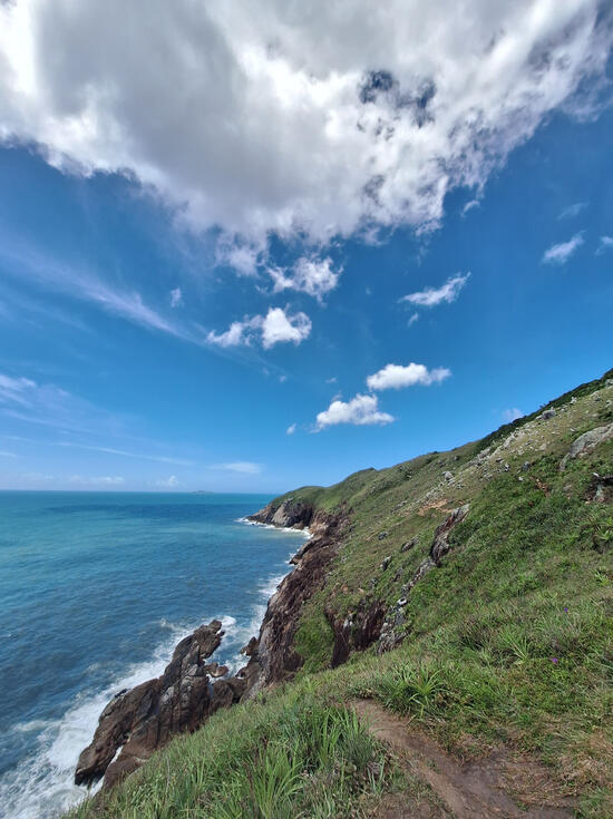 Cave in a hiking traili by the sea. Florianópolis, 2024.